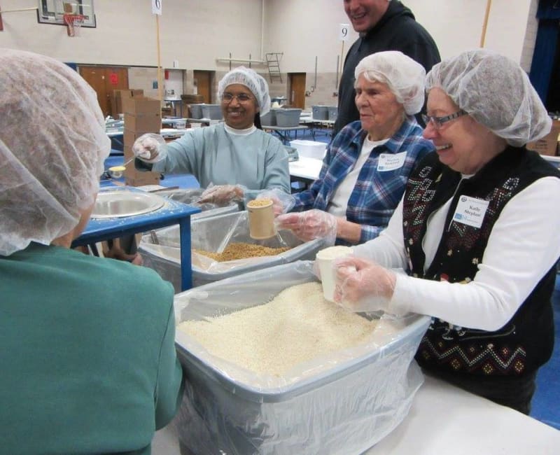 Group of residents volunteering near Willows Bend Senior Living in Fridley, Minnesota