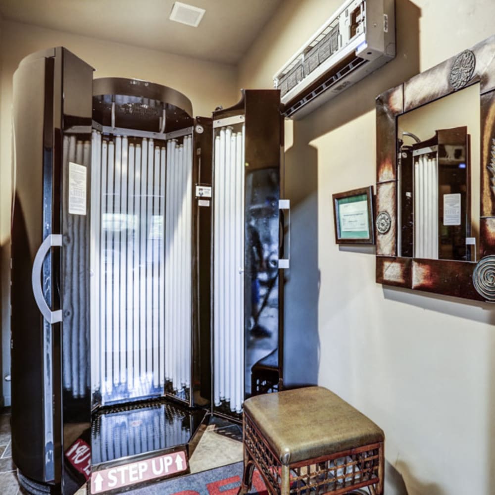 Standup tanning bed in resident clubhouse at London House Apartments in Lenexa, Kansas