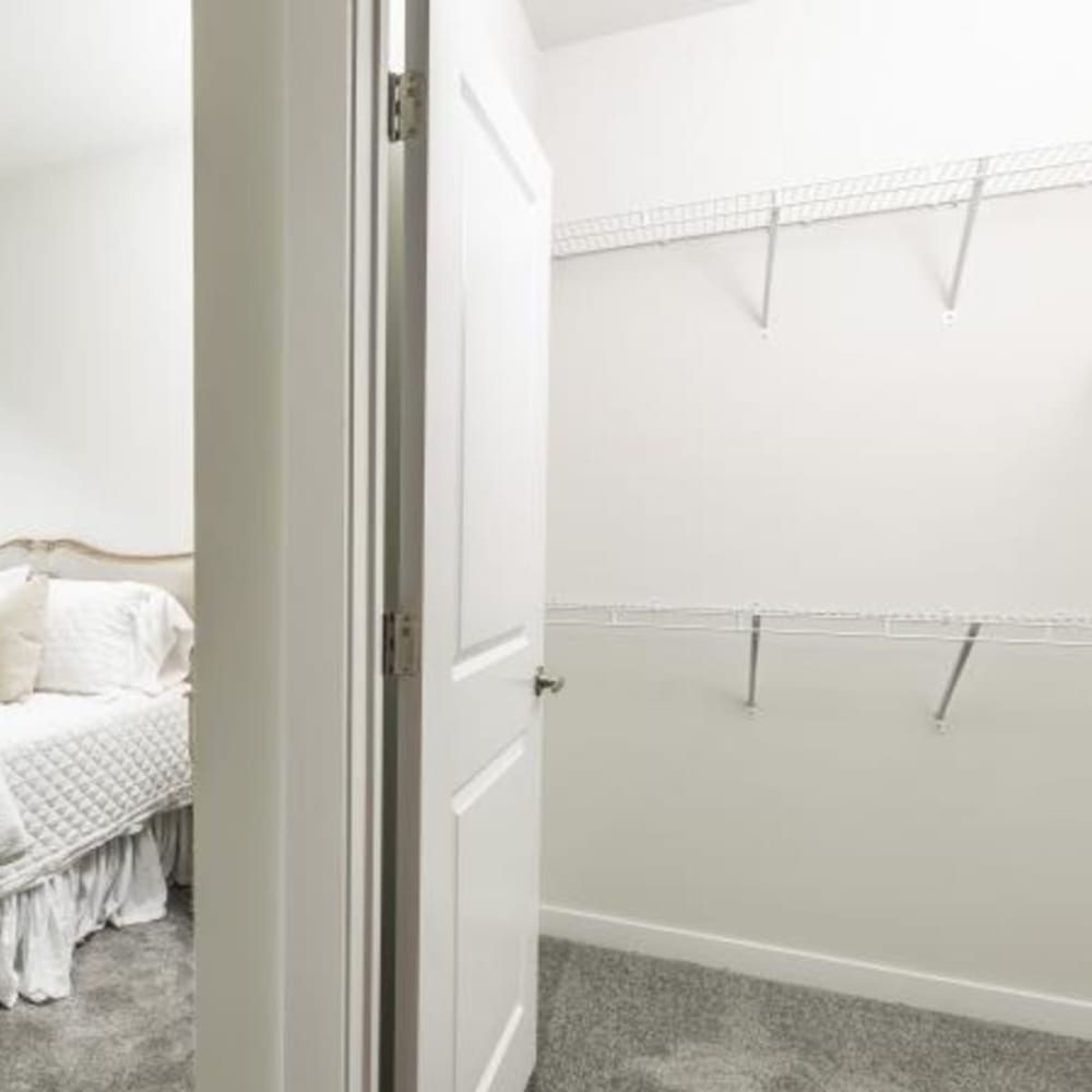 Plenty of space and shelving in a bedroom closet at Retreat at Fairhope Village in Fairhope, Alabama