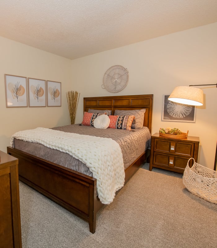 Spacious carpeted bedroom at Sugarberry Apartments in Tulsa, Oklahoma
