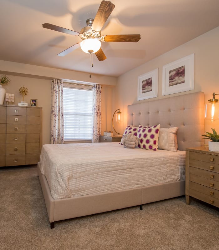 Spacious carpeted bedroom at Watercress Apartments in Maize, Kansas