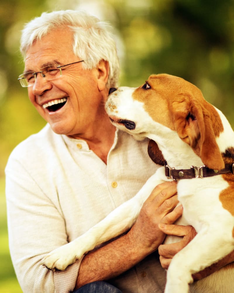 A Man and his dog at Spring Creek Village in Spring, Texas
