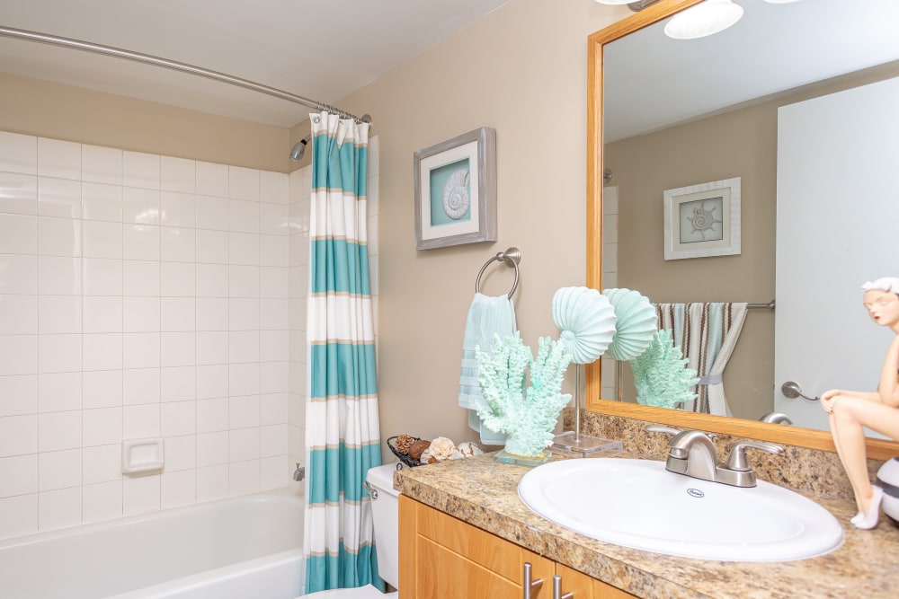A spacious and well-lighted restroom at Fairway View Apartments in Hialeah, Florida