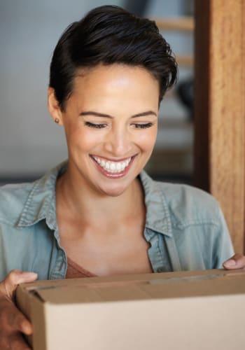 Resident getting a package at home at The Acadia in Chapel Hill, North Carolina