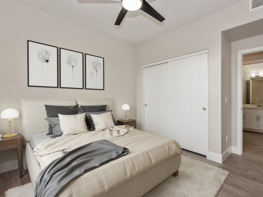 Comfortable bedroom at The Retreat Apartments in Phoenix, AZ