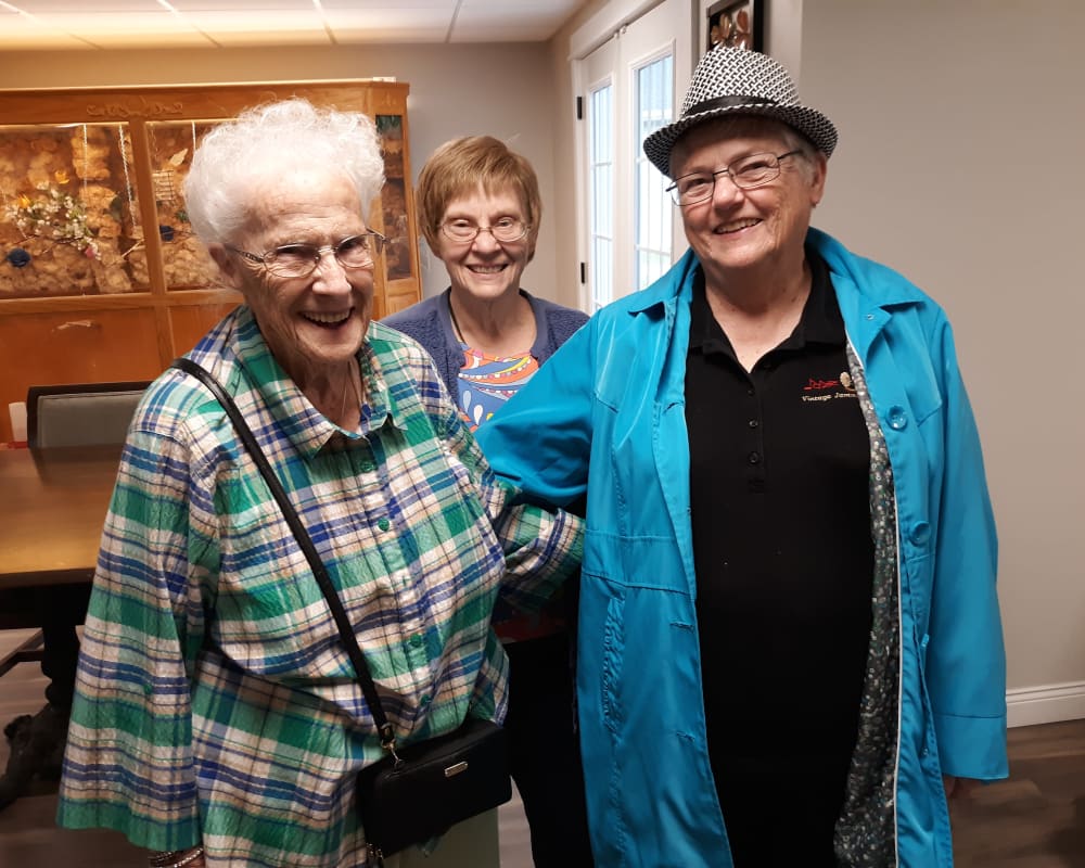 Smiling faces from residents at Corridor Crossing Place in Cedar Rapids, Iowa.