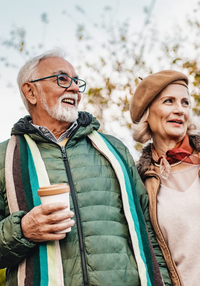 A man and women take a walk near at Chandler's Square Retirement Community in Anacortes, Washington