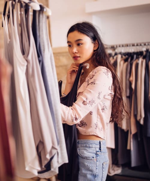 Resident shopping at a women's boutique near Annalise Glen Creek in Bradenton, Florida