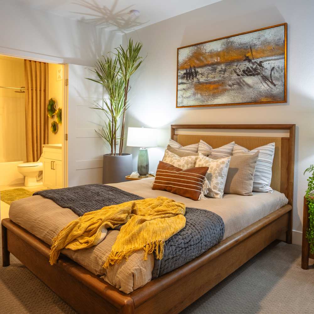 Bedroom with attached bathroom and side lamp at Night Fall in Las Vegas. NV