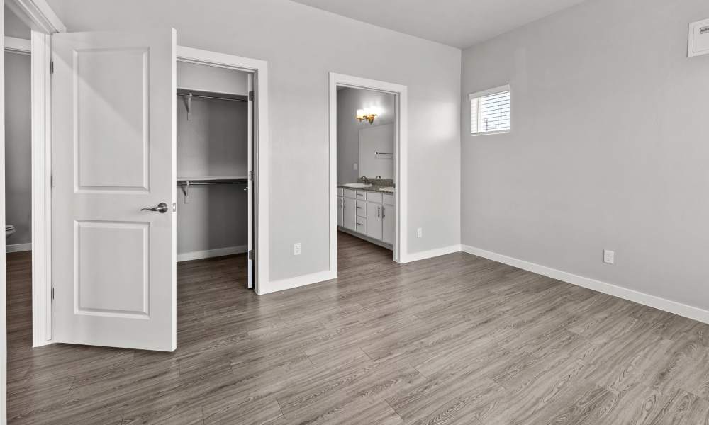 Unfurnised bedroom with attached bathroom and closet at Retreat at Horizon Hills in El Paso, Texas
