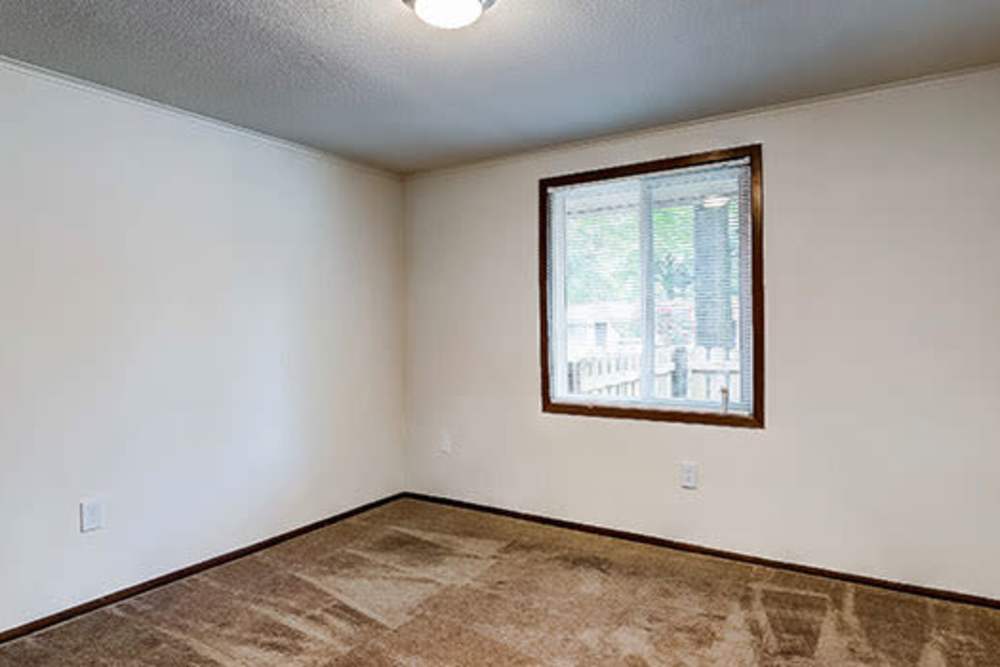Bedroom with window at Little Brook Apartments in Frederick, Maryland