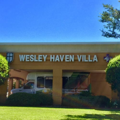 Gorgeous exterior view on a sunny day at Wesley Haven Villa in Pensacola, Florida. 