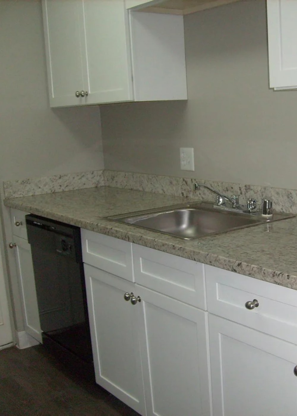 Kitchen with dishwasher at Park Place Apartments in Roseville, California