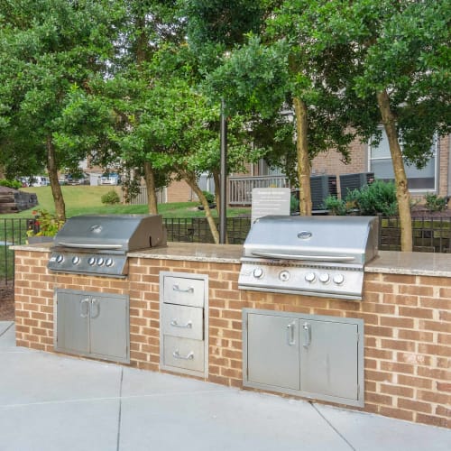Grilling stations next to the community pool at Hickory Creek in Henrico, Virginia