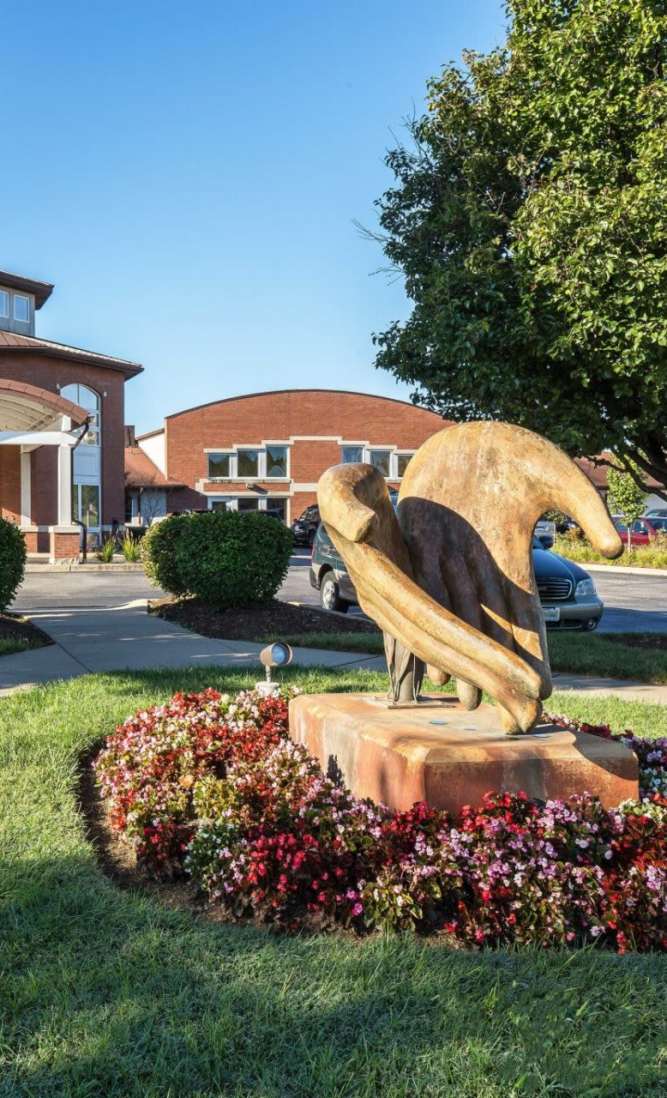 Beautiful open hands sculpture  at Dougherty Ferry in Valley Park, Missouri