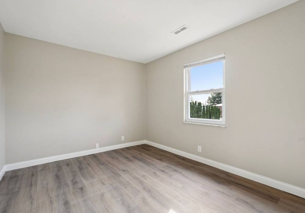 Bedroom with air conditioning at Charleston Square Apartments in Columbus, Indiana
