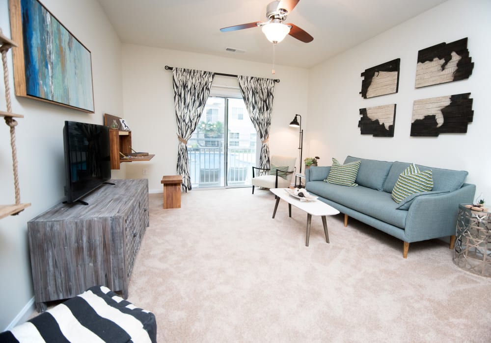 Enjoy a luxury living room at Manor Six Forks in Raleigh, North Carolina