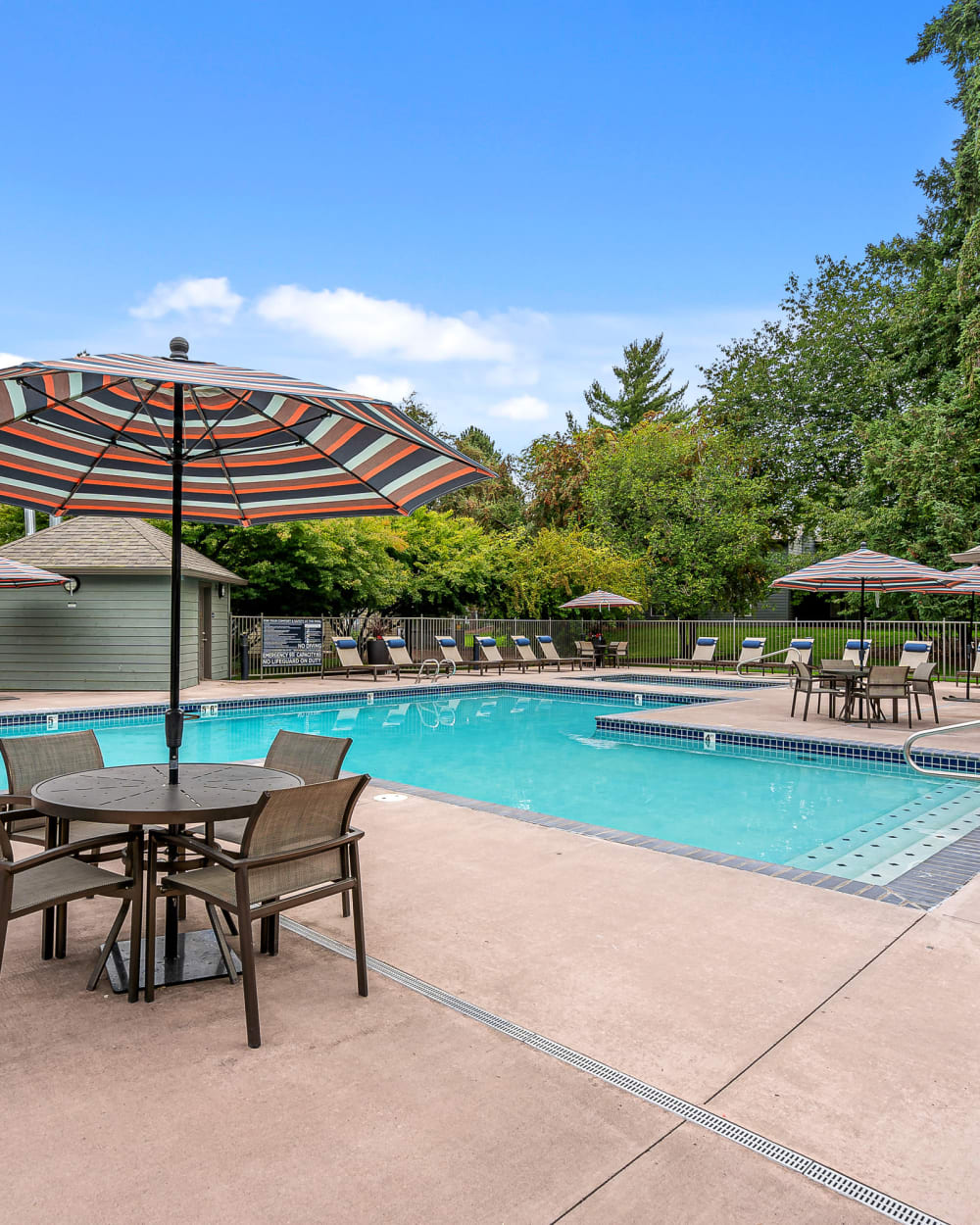 Picnic table by the pool at Terra at Hazel Dell in Vancouver, Washington