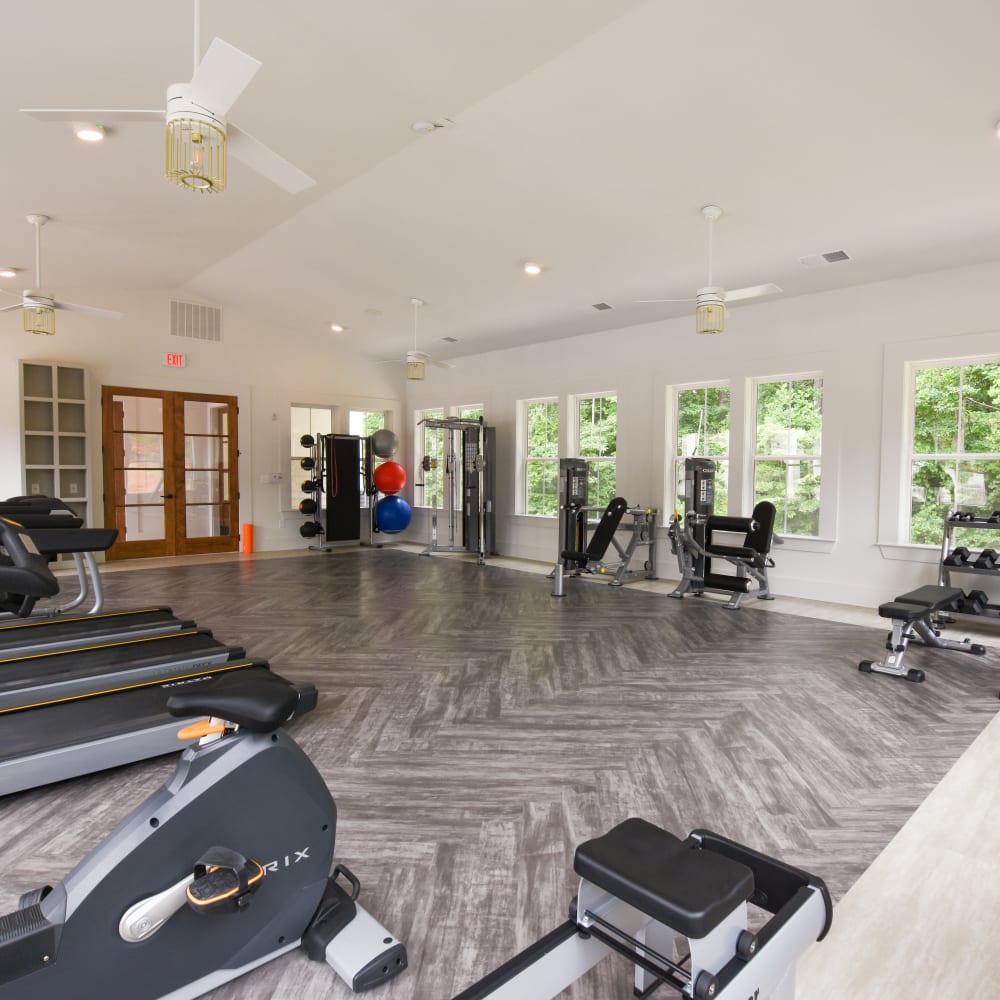 Fitness center with treadmills at The Archer In Acworth in Acworth, Georgia