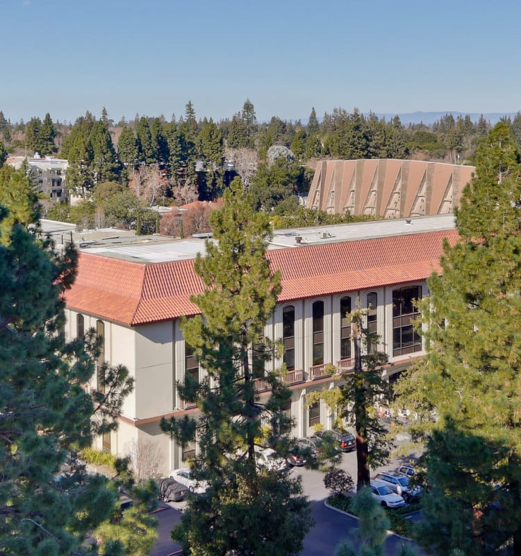 The Marc, Palo Alto surrounded by a lush landscape in Palo Alto, California