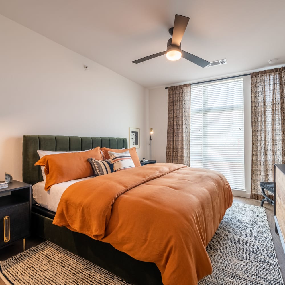 Cute bedroom with tons of natural light at The Langford in Dallas, Texas