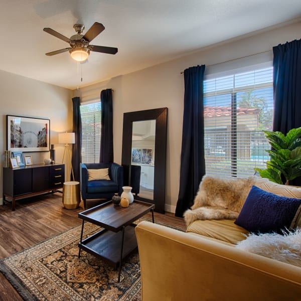 Living room with wood flooring at The Ventura in Chandler, Arizona