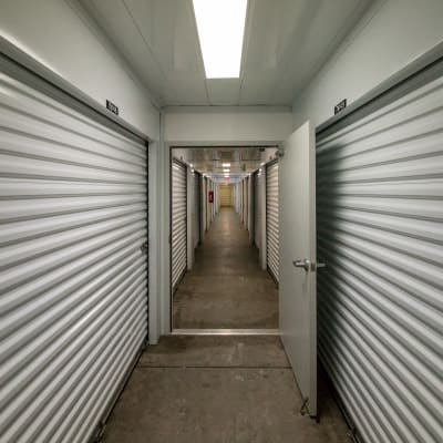 Hall of self storage units for rent at Neighborhood Storage in Belleview, FL