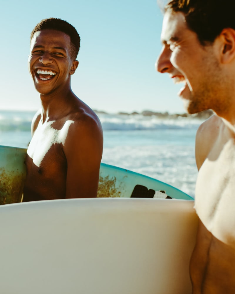 Students surfing near Rise Manoa in Honolulu, Hawaii