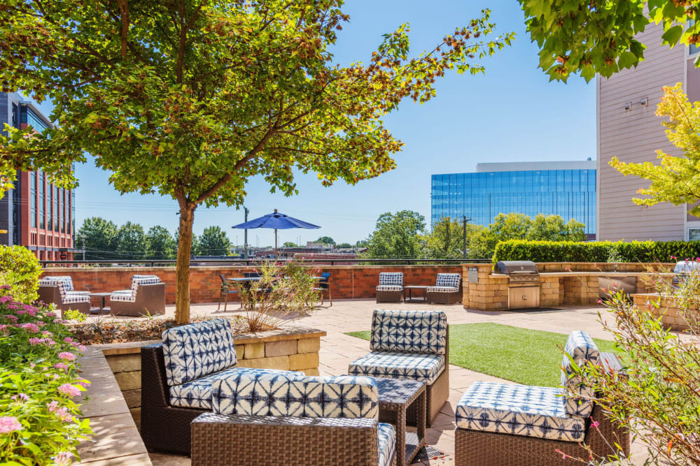 Outdoor lounge and grilling pavilion at District Flats in Charlotte, North Carolina