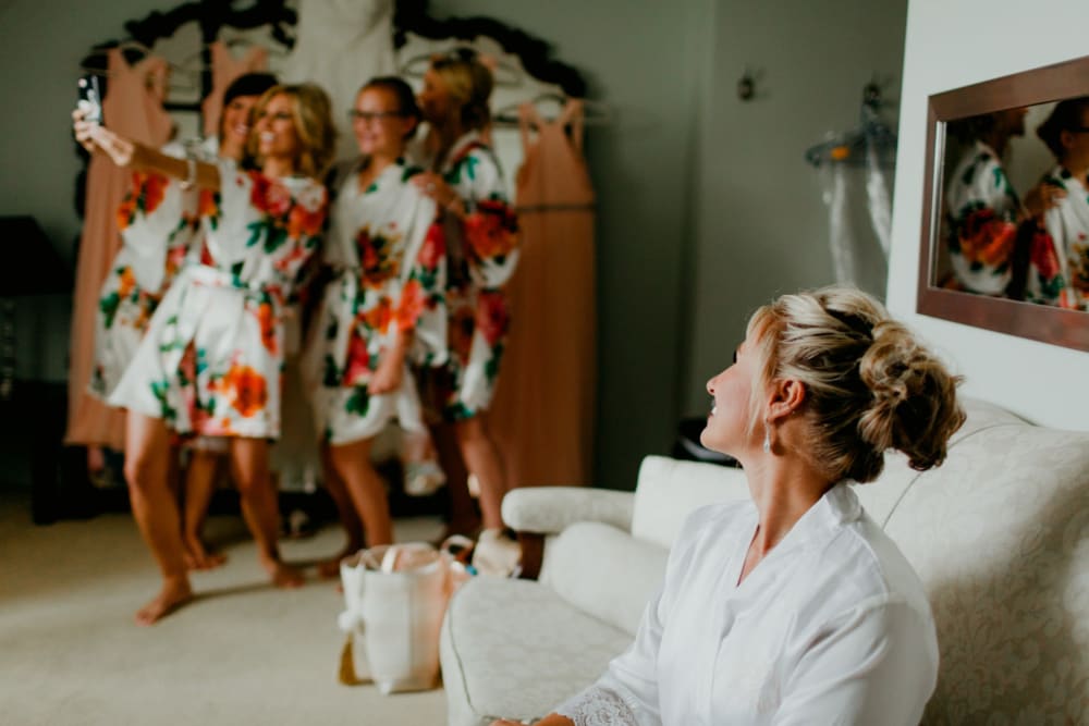 Bride and bridesmaids at The Whitcomb Senior Living Tower in St. Joseph, Michigan