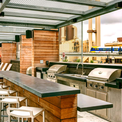 Outdoor grilling area at Junction Flats in Minneapolis, Minnesota