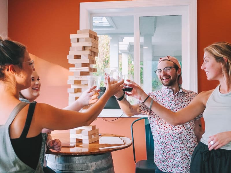 Caretakers playing jenga at English Meadows in Blacksburg, Virginia