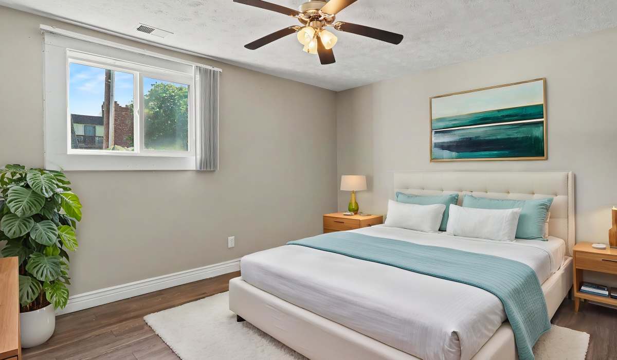 Bedroom with large window at Wildewood Commons in Ralston, Nebraska