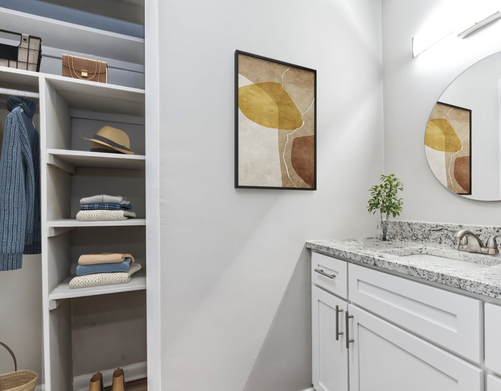 Bathroom with Cabinets at Merrill House Apartments in Falls Church, Virginia