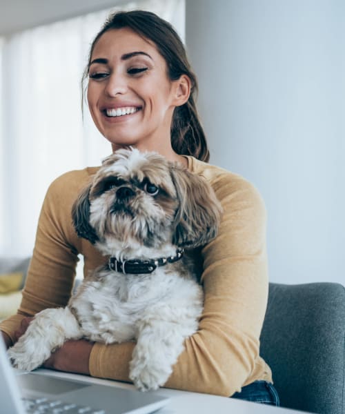 Resident and their dog at Village at Santa Teresa in Gilroy, California