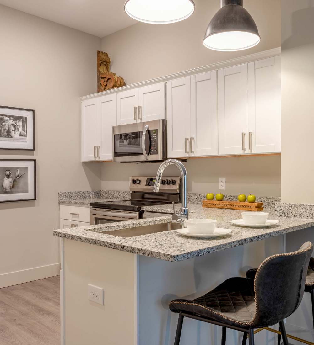 Counter seating in the kitchen at Gateway Lofts in Lansing, Michigan