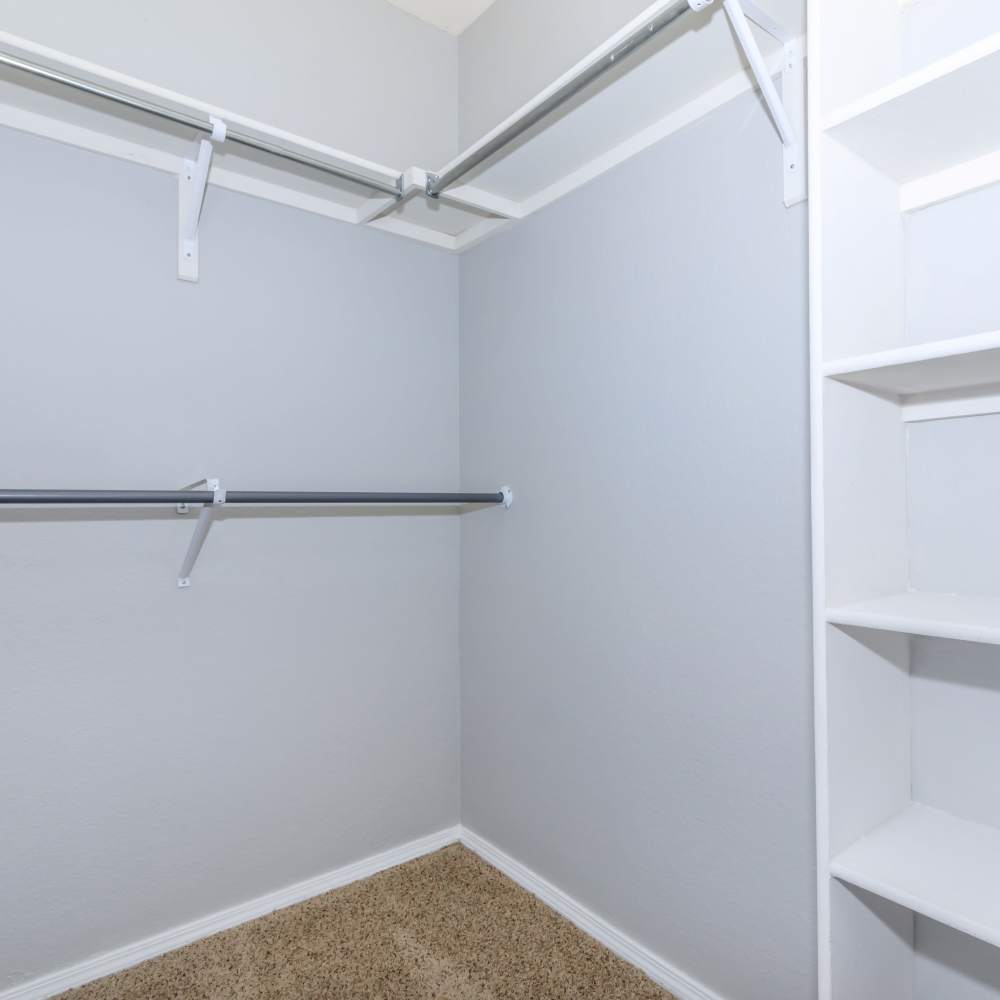 Walk-in closet with racks at One Belmar Place in Lakewood,Colorado