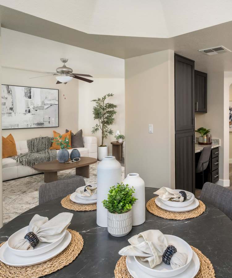 Model living room with hardwood flooring at San Marin at the Civic Center