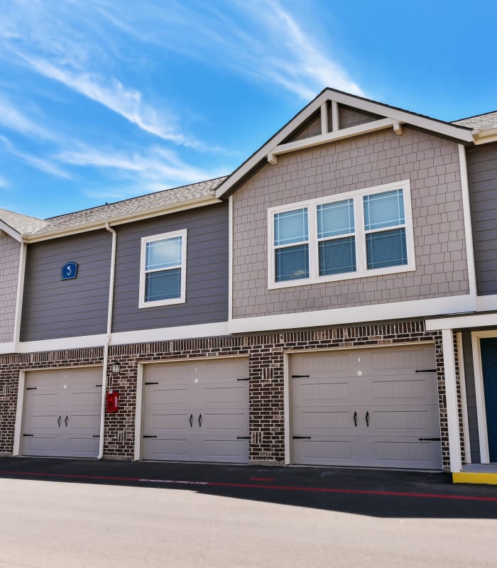 Garage parking at Cottages at Abbey Glen Apartments in Lubbock, Texas