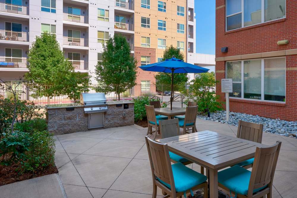 Common space and barbecue grill at Helios in Englewood, Colorado