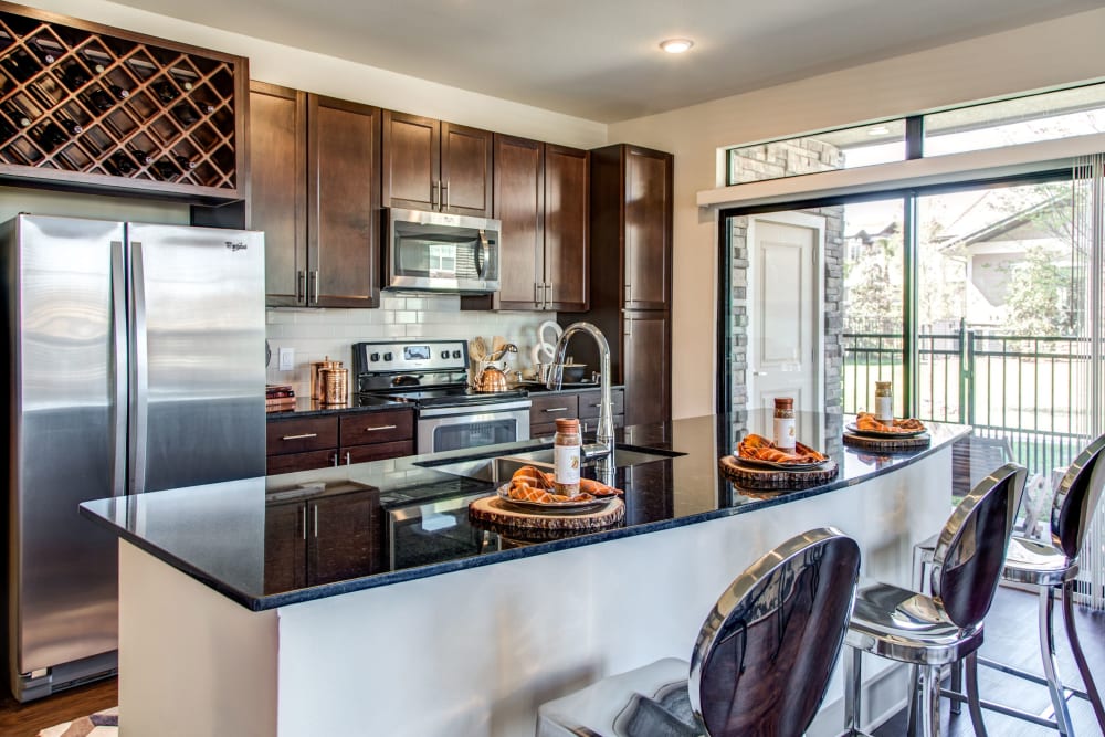 Beautifully furnished model kitchen at Waterford Trails in Spring, Texas