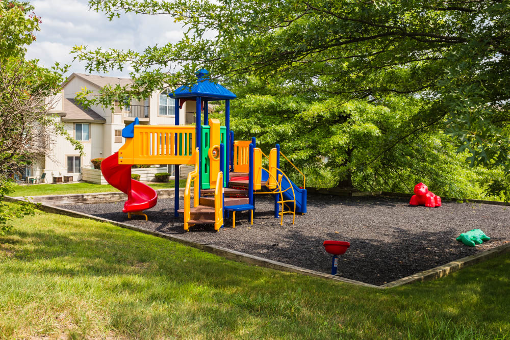 Playground with a slide at Briar Cove Terrace Apartments in Ann Arbor, Michigan