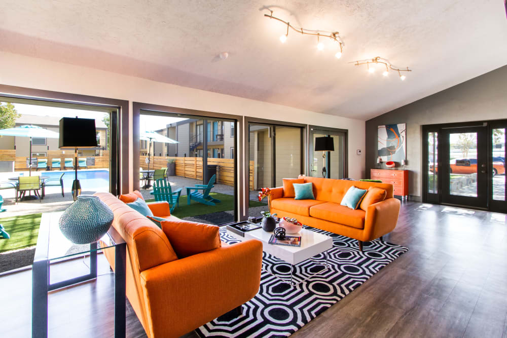 Modern interior and lounge area inside the clubhouse at Sausalito Apartments in College Station, Texas