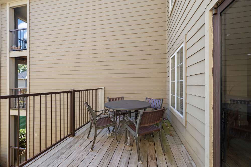 Balcony with seating area at Villas At Copper Leaf in Nixa,Missouri