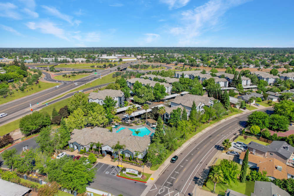 Aerial shot of apartments with road connectivity at Avion Apartments in Rancho Cordova, California