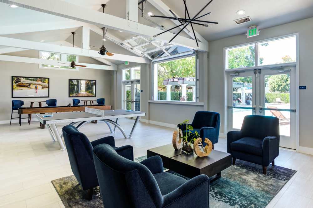 Interior of the clubhouse at The Woodlands Apartments in Sacramento, California