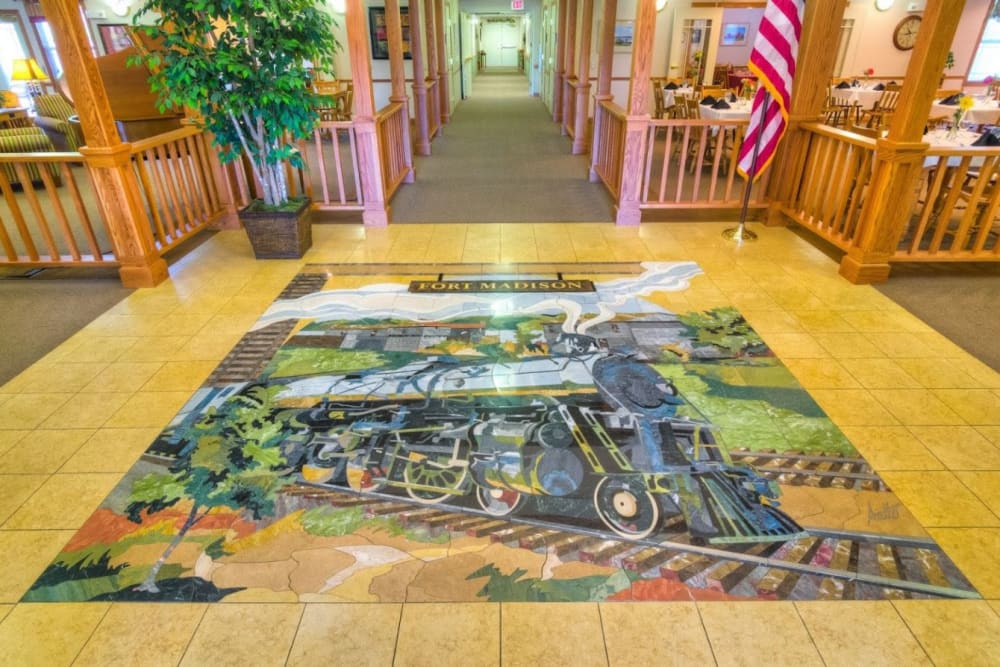 Closeup of the lobby's tile mosaic at Addington Place of Fort Madison in Fort Madison, Iowa
