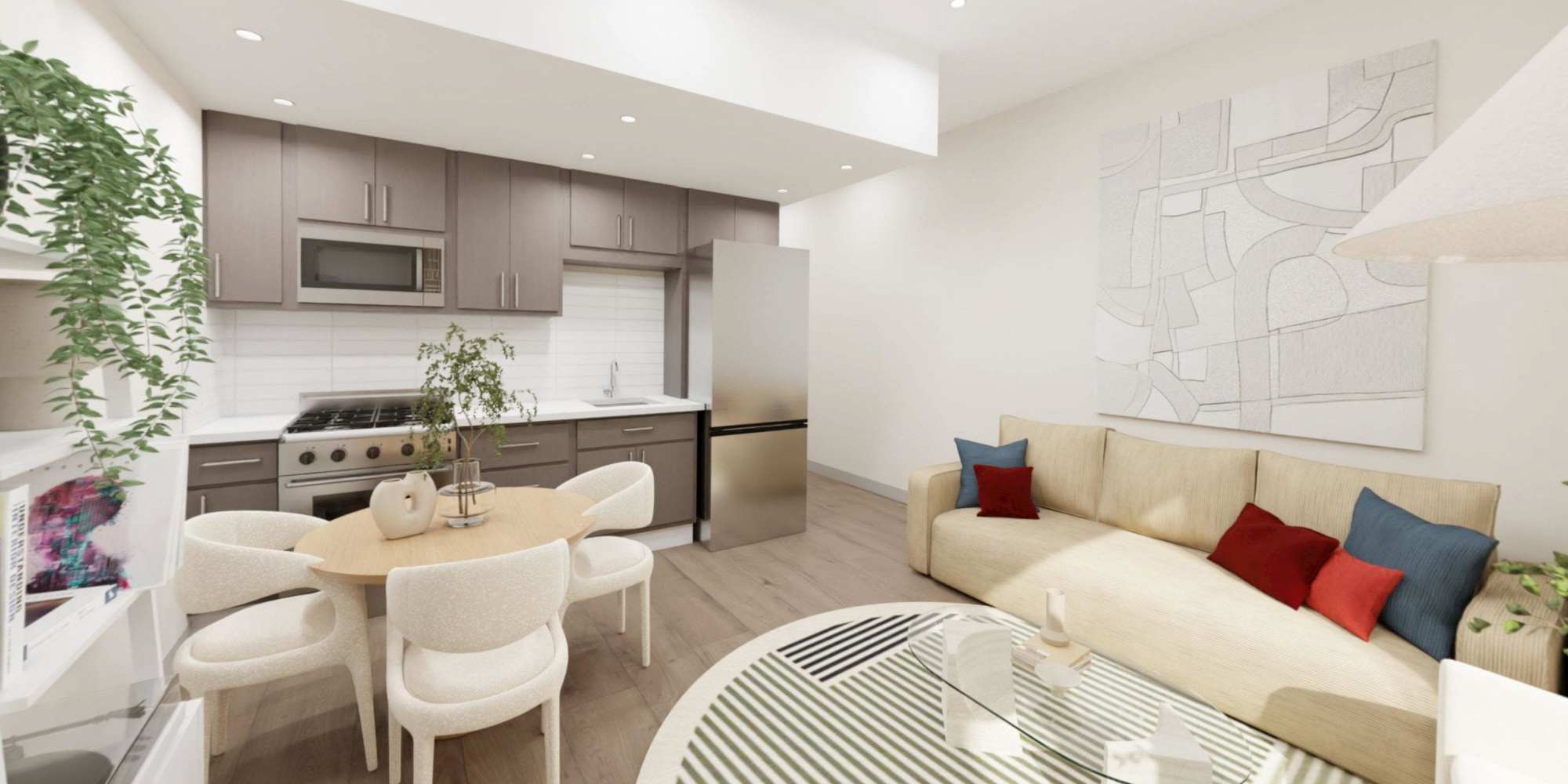 Open-concept of kitchen and living room at The Maxx and The Alexandra in Pittsburgh,Pennsylvania