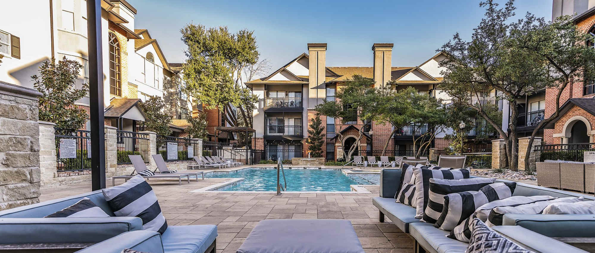 View of pool area at Carrara At Cole in Dallas, Texas