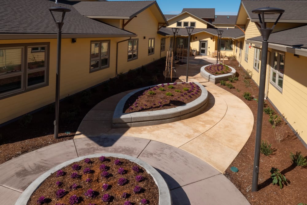 Garden beds in courtyard outside Pear Valley Senior Living in Central Point, Oregon